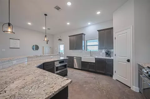 Kitchen - 16702 Dipple Rd, Guy, TX 77444 photo 3 of 6