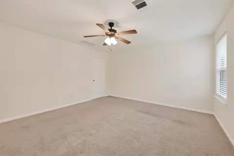 Bedroom - 2107 Parnevik Pl, Conroe, TX 77304 photo 3 of 7