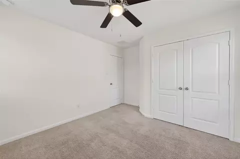 Bedroom - 2107 Parnevik Pl, Conroe, TX 77304 photo 5 of 7