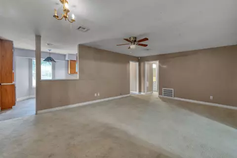 Living - 405 Wilson Rd, Conroe, TX 77301 photo 2 of 6