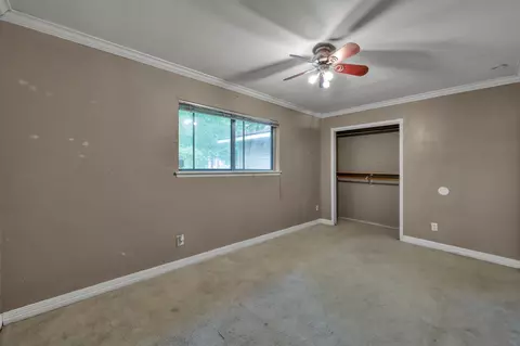 Bedroom - 405 Wilson Rd, Conroe, TX 77301 photo 3 of 5