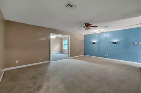 Living - 405 Wilson Rd, Conroe, TX 77301 photo 3 of 6