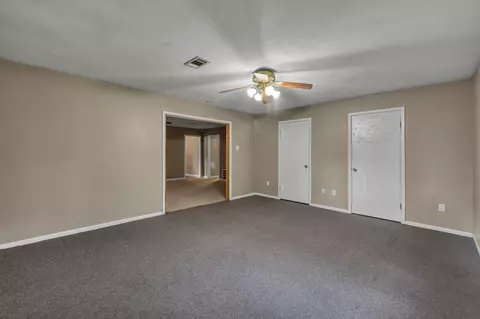 Living - 405 Wilson Rd, Conroe, TX 77301 photo 5 of 6