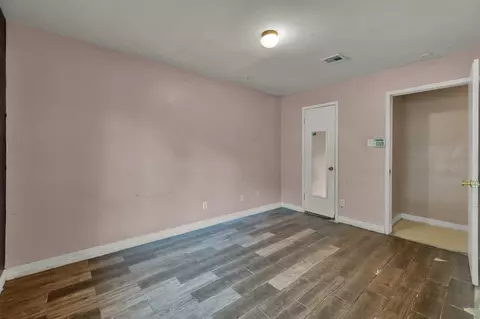 Bedroom - 405 Wilson Rd, Conroe, TX 77301 photo 5 of 5