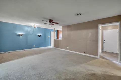 Living - 405 Wilson Rd, Conroe, TX 77301 photo 4 of 6