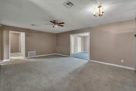 Living - 405 Wilson Rd, Conroe, TX 77301 photo 1 of 6