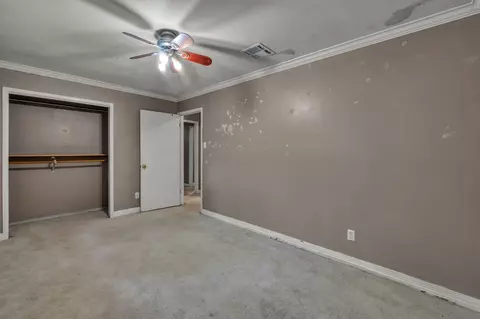 Bedroom - 405 Wilson Rd, Conroe, TX 77301 photo 2 of 5