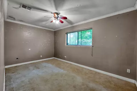 Bedroom - 405 Wilson Rd, Conroe, TX 77301 photo 1 of 5