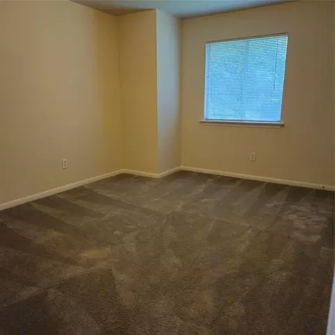 Bedroom - 42 Drifting Shadows Cir, Conroe, TX 77385 photo 2 of 3