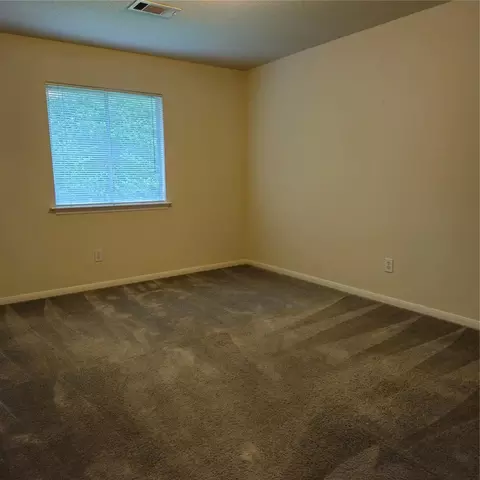 Bedroom - 42 Drifting Shadows Cir, Conroe, TX 77385 photo 3 of 3