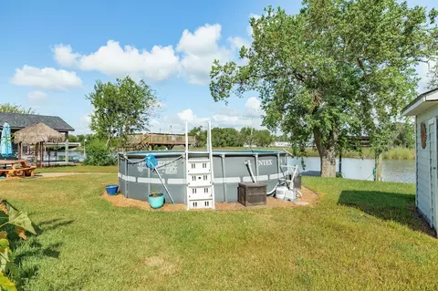 Exterior - 139 Bastrop Beach Rd, Angleton, TX 77515 photo 5 of 8