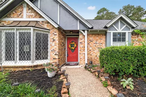 Exterior - 303 Springwood St, New Caney, TX 77357 photo 3 of 15