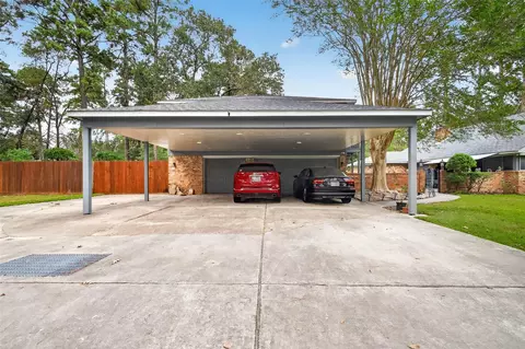 Exterior - 303 Springwood St, New Caney, TX 77357 photo 7 of 15