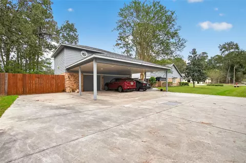 Exterior - 303 Springwood St, New Caney, TX 77357 photo 8 of 15
