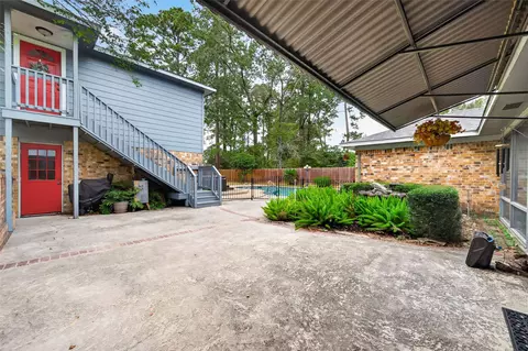 Exterior - 303 Springwood St, New Caney, TX 77357 photo 12 of 15