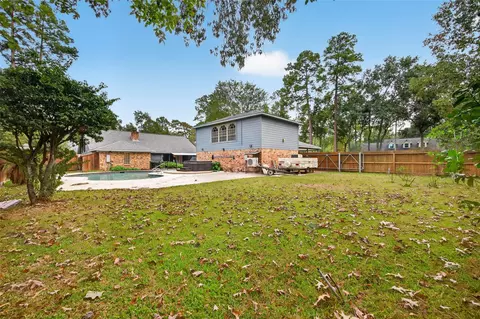 Exterior - 303 Springwood St, New Caney, TX 77357 photo 10 of 15