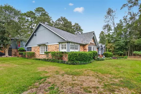 Exterior - 303 Springwood St, New Caney, TX 77357 photo 5 of 15