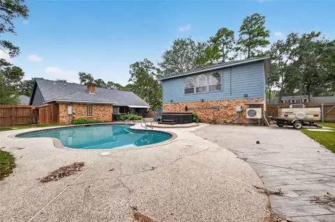 Exterior - 303 Springwood St, New Caney, TX 77357 photo 11 of 15