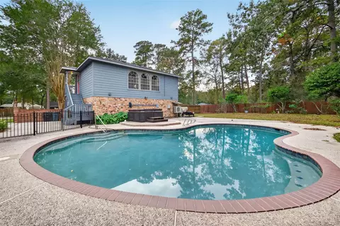 Exterior - 303 Springwood St, New Caney, TX 77357 photo 13 of 15