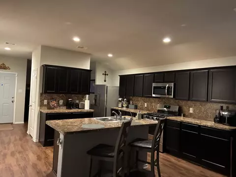 Kitchen - 5606 Mesquite Oaks Trl, Spring, TX 77389 photo 2 of 2