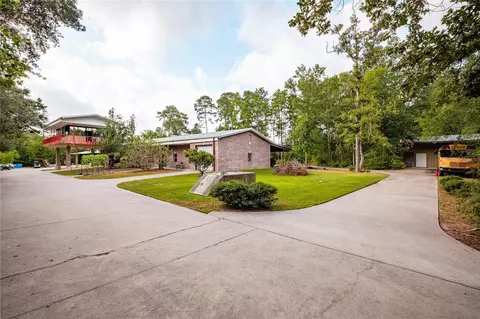 Exterior - 9800 Ramzi Dr, Conroe, TX 77303 photo 8 of 12