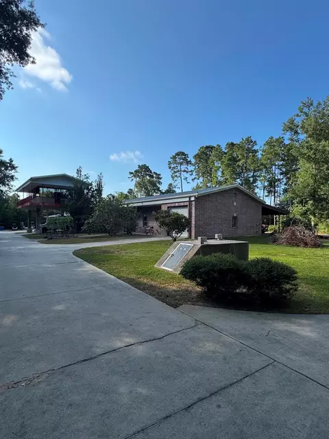 Exterior - 9800 Ramzi Dr, Conroe, TX 77303 photo 4 of 12
