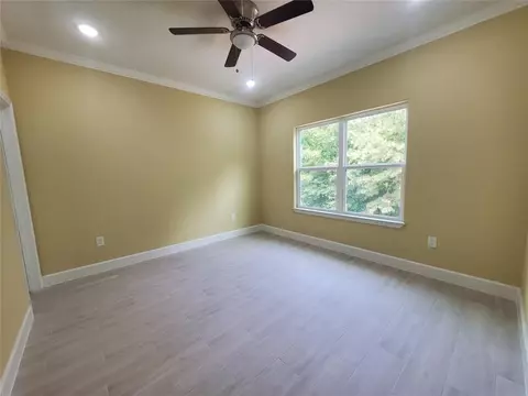 Bedroom - 1306 N 9th St, Conroe, TX 77301 photo 3 of 5