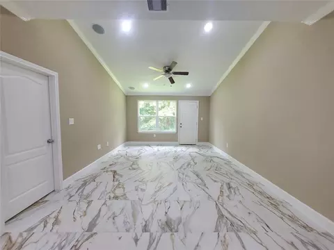 Living - 1306 N 9th St, Conroe, TX 77301 photo 2 of 9
