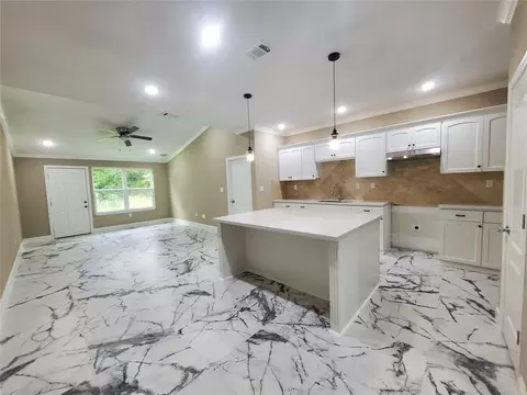 Living - 1306 N 9th St, Conroe, TX 77301 photo 5 of 9