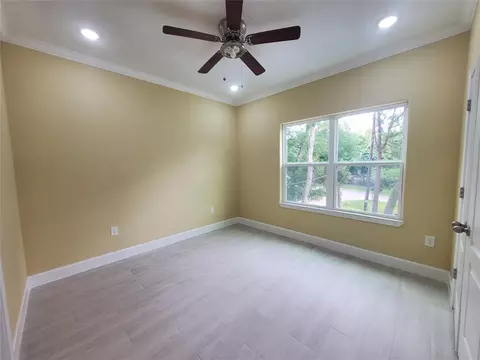 Bedroom - 1306 N 9th St, Conroe, TX 77301 photo 5 of 5