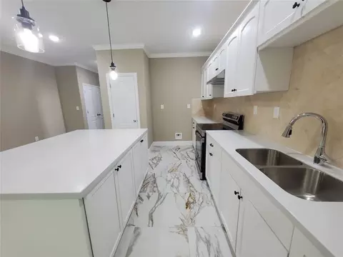 Kitchen - 1306 N 9th St, Conroe, TX 77301 photo 1 of 3