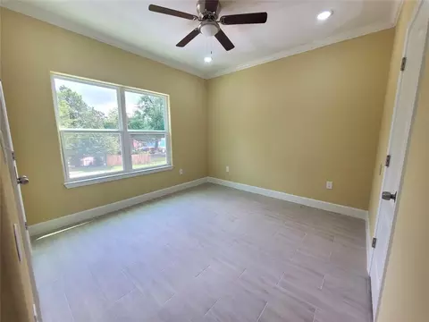 Bedroom - 1306 N 9th St, Conroe, TX 77301 photo 2 of 5