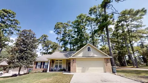 Exterior - 13934 Dolphin Dr, Willis, TX 77318 photo 2 of 10