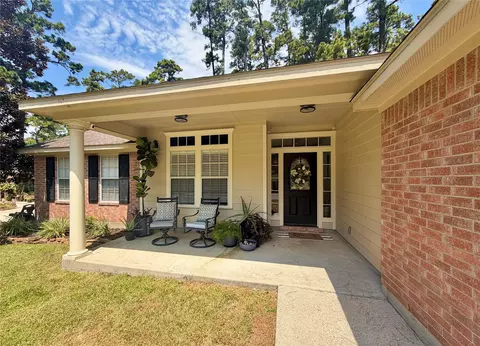 Exterior - 13934 Dolphin Dr, Willis, TX 77318 photo 3 of 10