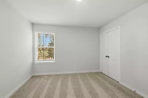 Bedroom - 402 Elf Owl Ct, Willis, TX 77318 photo 4 of 6