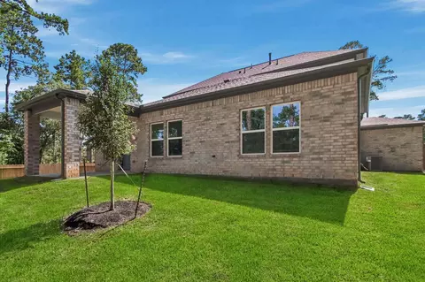 Exterior - 402 Elf Owl Ct, Willis, TX 77318 photo 3 of 5