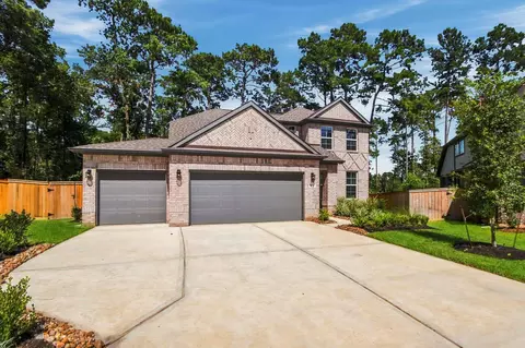 Exterior - 402 Elf Owl Ct, Willis, TX 77318 photo 2 of 5