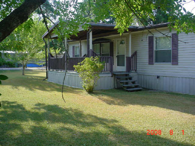 11727 White Cedar, Willis, TX 77318 photo 1