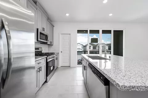 Kitchen - 14970 Eagle Feather Dr, Houston, TX 77090 photo 2 of 4
