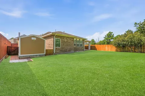 Exterior - 1122 Windsor Chase Ln, Spring, TX 77373 photo 11 of 15