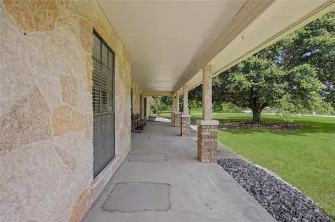 Exterior - 16558 Green Meadow Loop, Willis, TX 77318 photo 3 of 11
