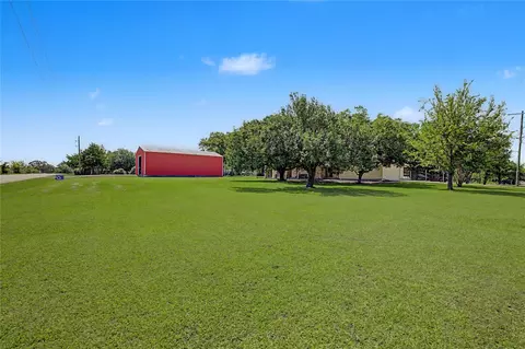 Exterior - 16558 Green Meadow Loop, Willis, TX 77318 photo 8 of 11