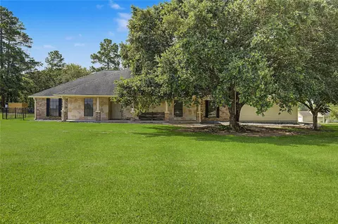 Exterior - 16558 Green Meadow Loop, Willis, TX 77318 photo 2 of 11