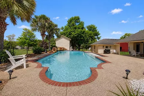 Exterior - 16558 Green Meadow Loop, Willis, TX 77318 photo 7 of 11