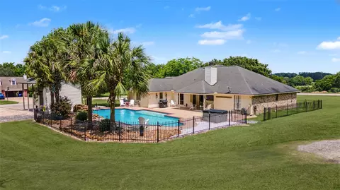 Exterior - 16558 Green Meadow Loop, Willis, TX 77318 photo 1 of 11