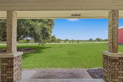 Exterior - 16558 Green Meadow Loop, Willis, TX 77318 photo 4 of 11