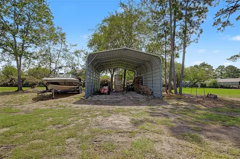 Exterior - 16558 Green Meadow Loop, Willis, TX 77318 photo 9 of 11