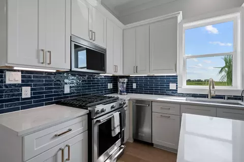 Kitchen - 683 Seaside Dr, Crystal Beach, TX 77650 photo 2 of 3