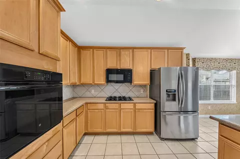 Kitchen - 1114 Bringewood Chase Dr, Spring, TX 77379 photo 2 of 3