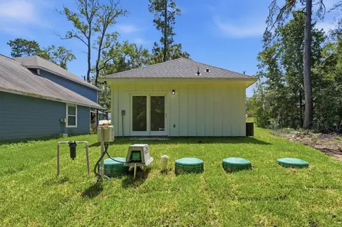 Exterior - 15290 Arrowhead Loop W, Willis, TX 77378 photo 2 of 6